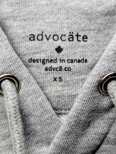 inside neck print of the purpose hoodie by advocäte showing brand logo and designed in canada text on organic cotton fleece